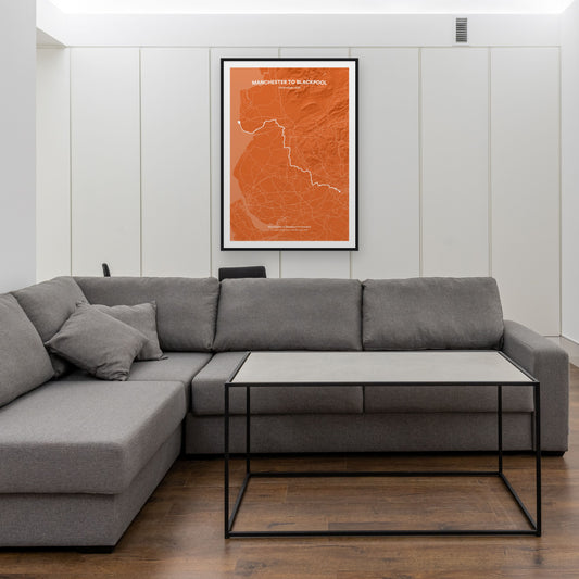 Manchester to Blackpool map print framed in a room